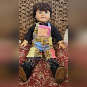 American Girl Doll with Multicolor Overalls and Black Shirt